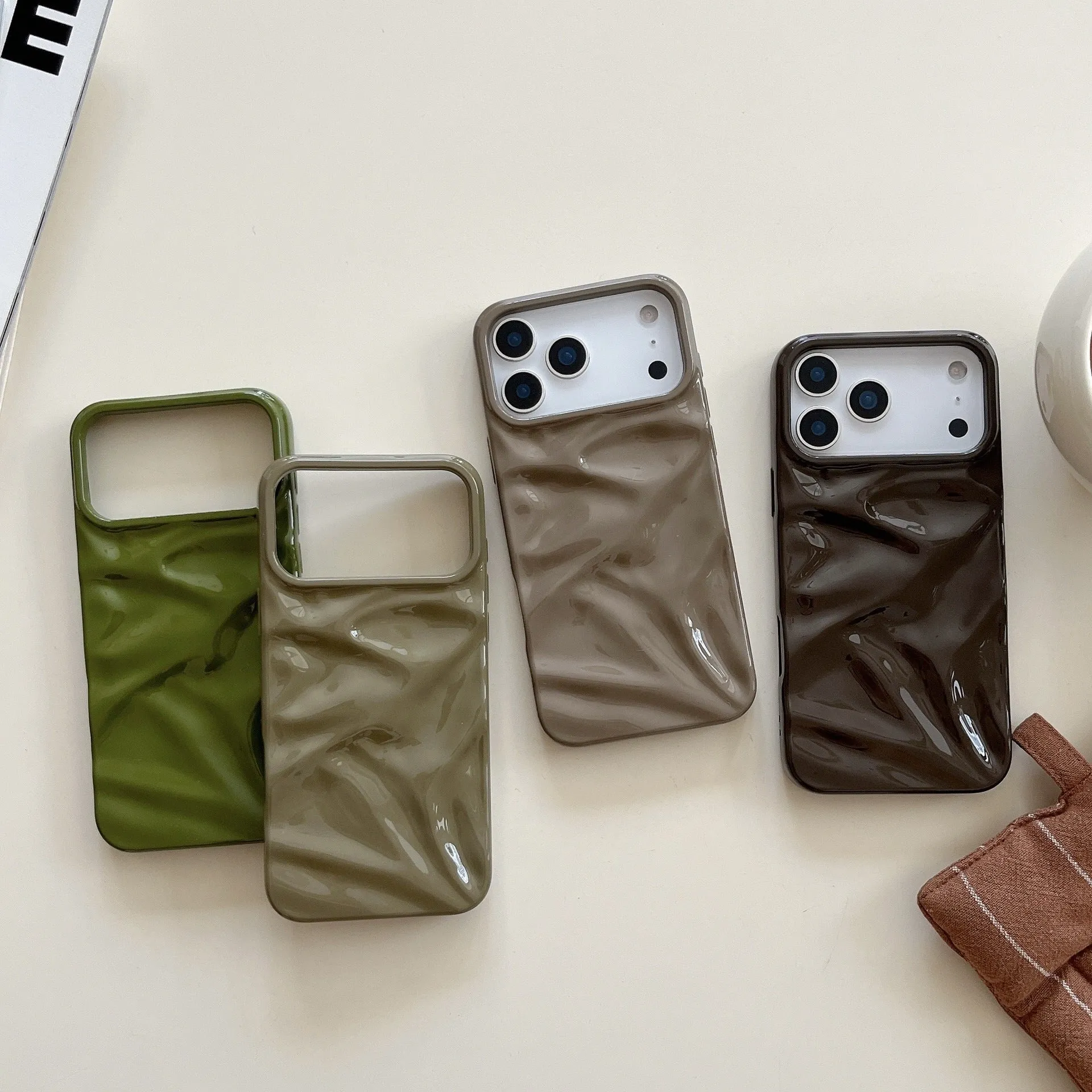 QF pleated TPU phone case in green for iPhone 15 Pro with three-dimensional textured pattern
