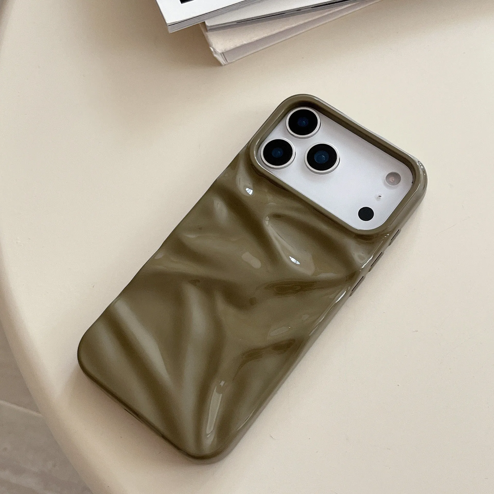 QF pleated TPU phone case in green for iPhone 15 Pro with three-dimensional textured pattern