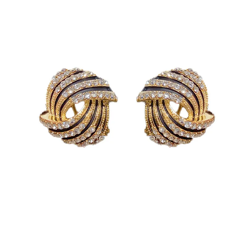 Super-flashing rhinestone ear studs with thick real gold plating on copper in a geometric ring style