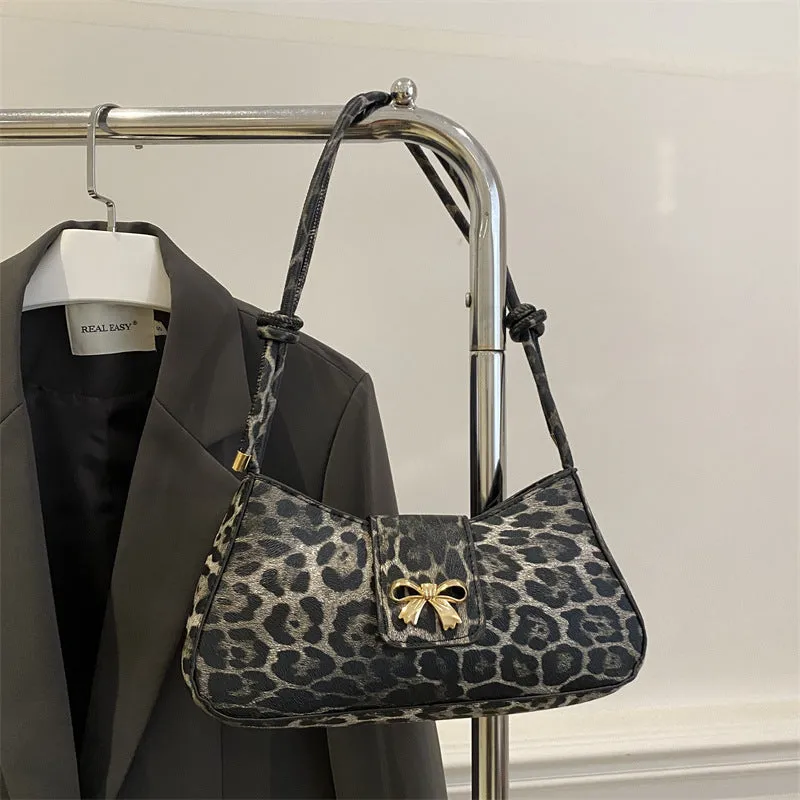 Women's large casual PU leather shoulder handbag with sandwich pocket in khaki colour.