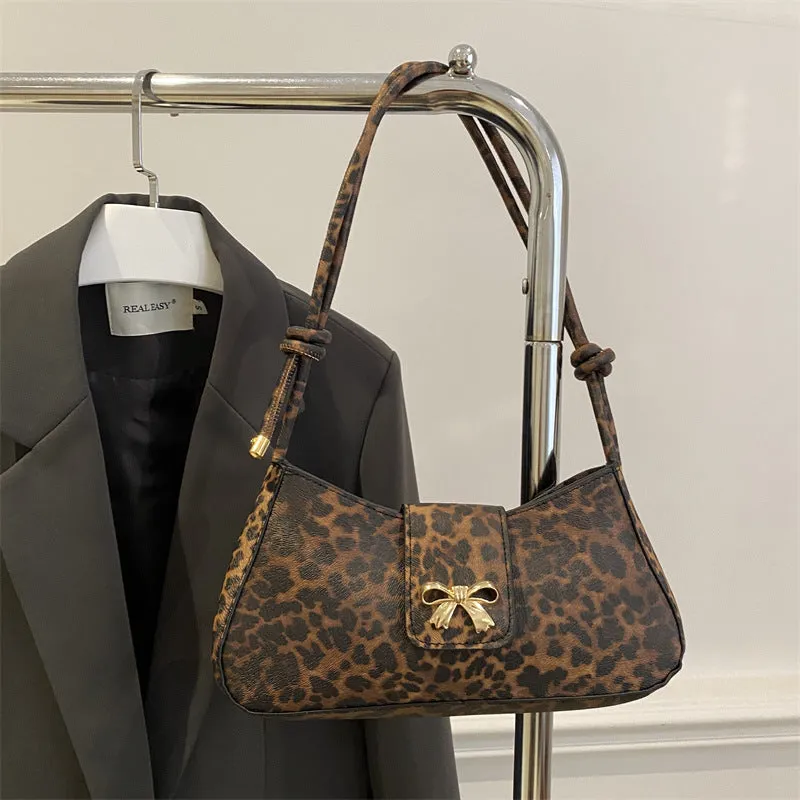 Women's large casual PU leather shoulder handbag with sandwich pocket in khaki colour.