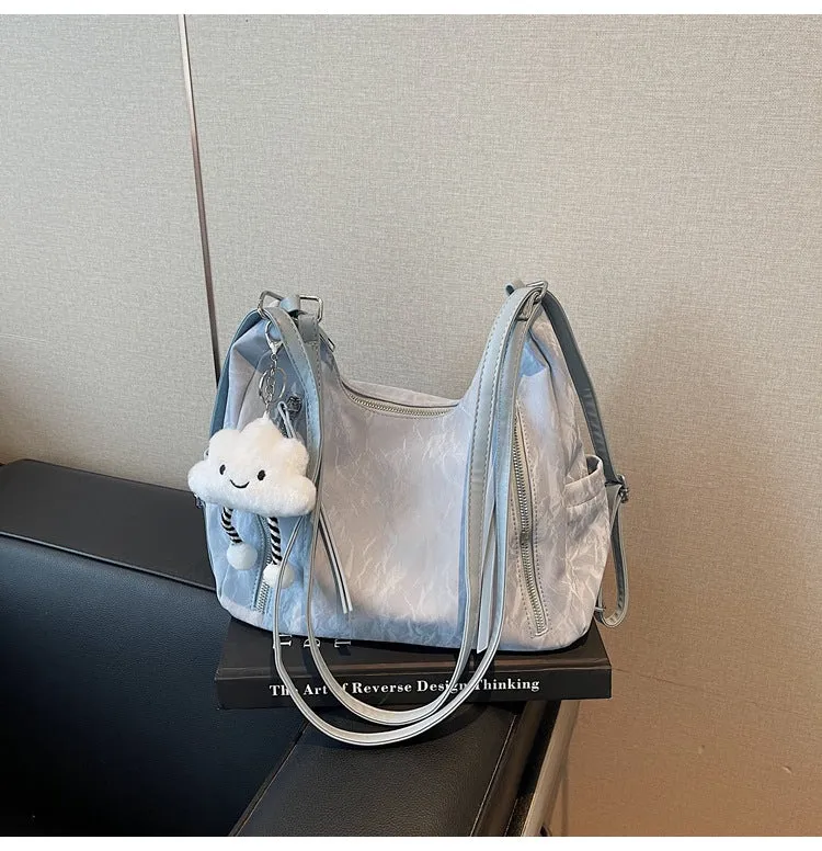 Women's soft PU fashion backpack with pendant accessory in multiple colour options