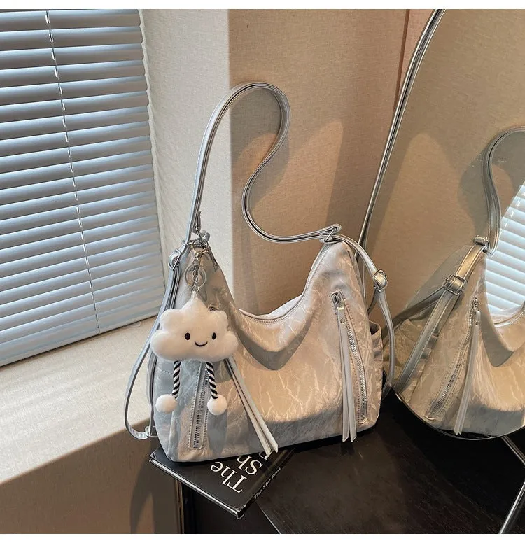 Women's soft PU fashion backpack with pendant accessory in multiple colour options