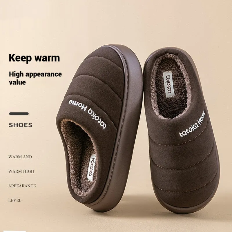 Pair of khaki fleece-lined cotton slippers with round toe and flat platform sole