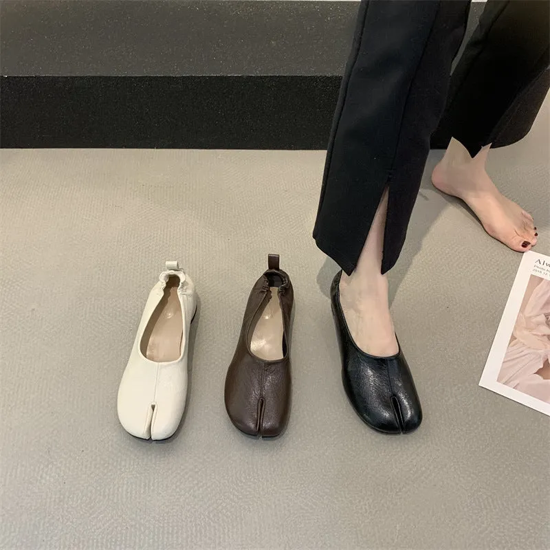 Women's apricot coloured chunky heel pumps with split toe horseshoe detail and round toe.