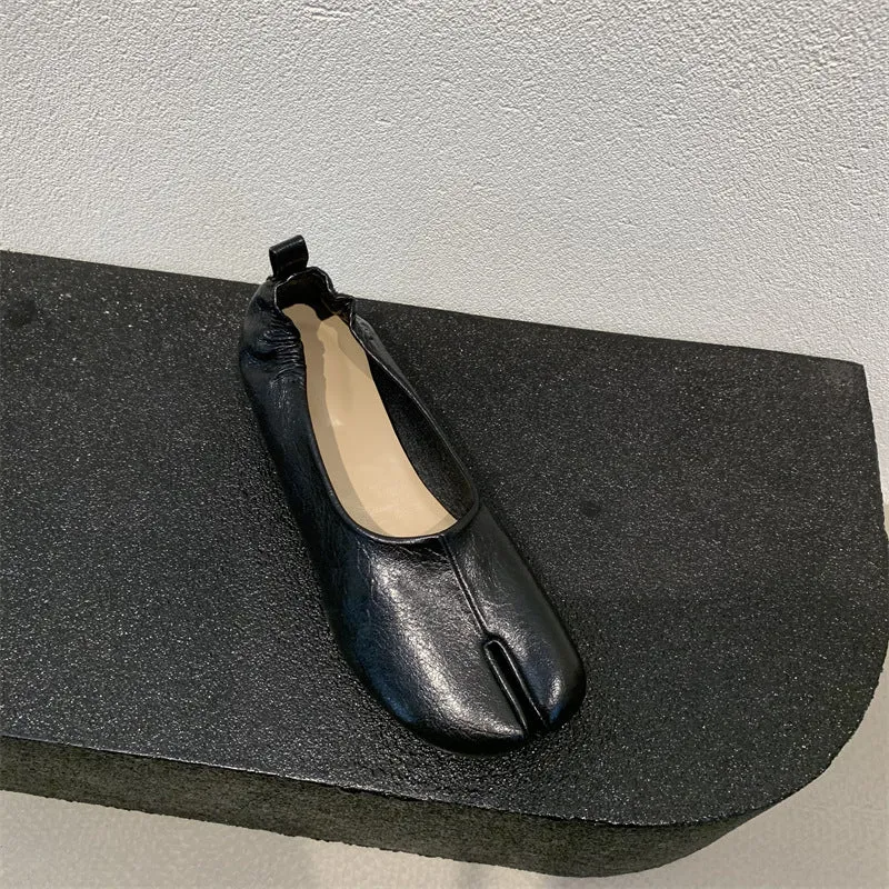 Women's apricot coloured chunky heel pumps with split toe horseshoe detail and round toe.