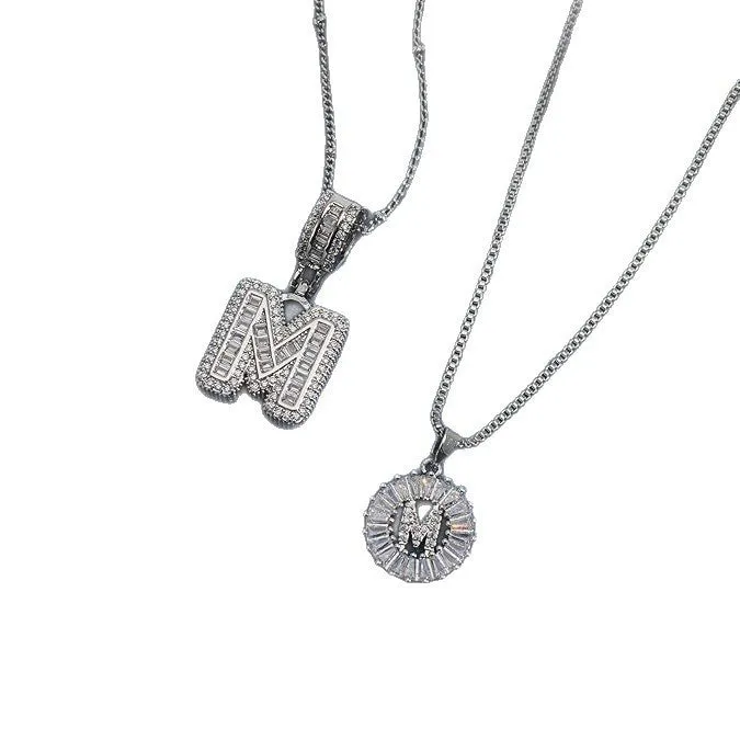 18K gold plated copper alphabet pendant necklace letter A with melon seeds chain on white background