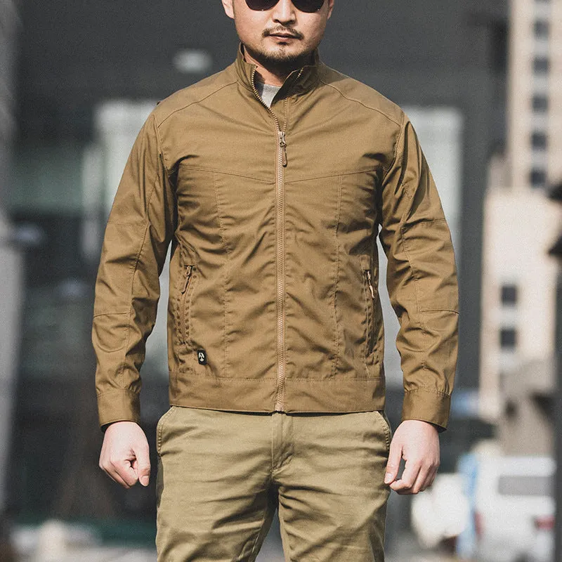 Man wearing a brown tactical camouflage polyester coat with multiple pockets.