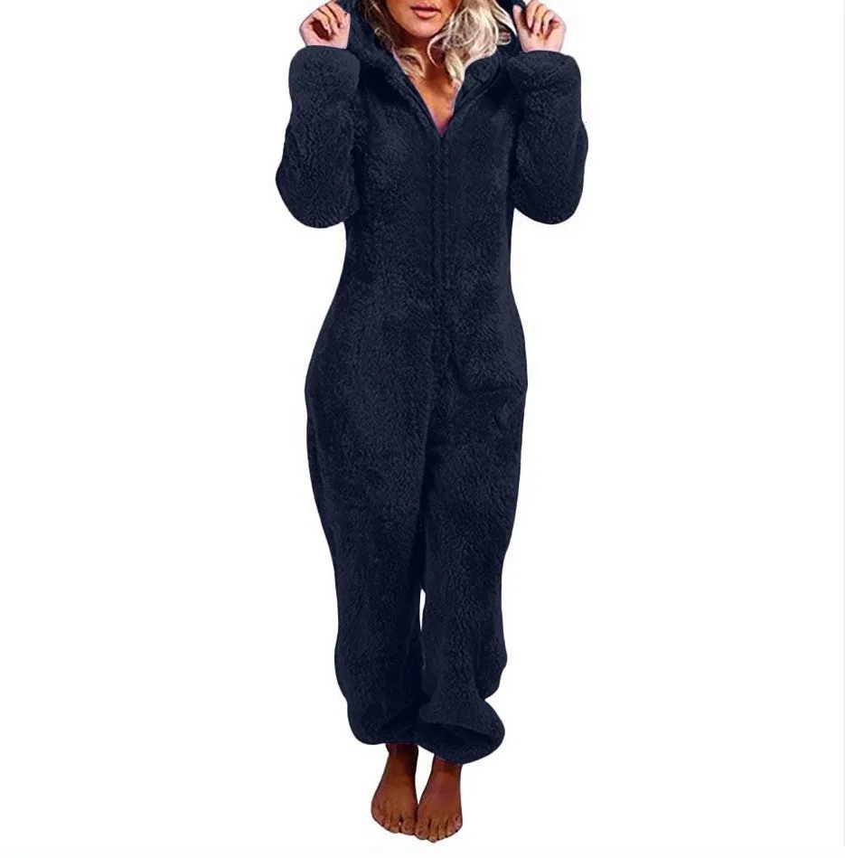 Fleece-lined thickened furry hooded jumpsuit pajama with zipper, loose fit, warm red colour lounging on bed