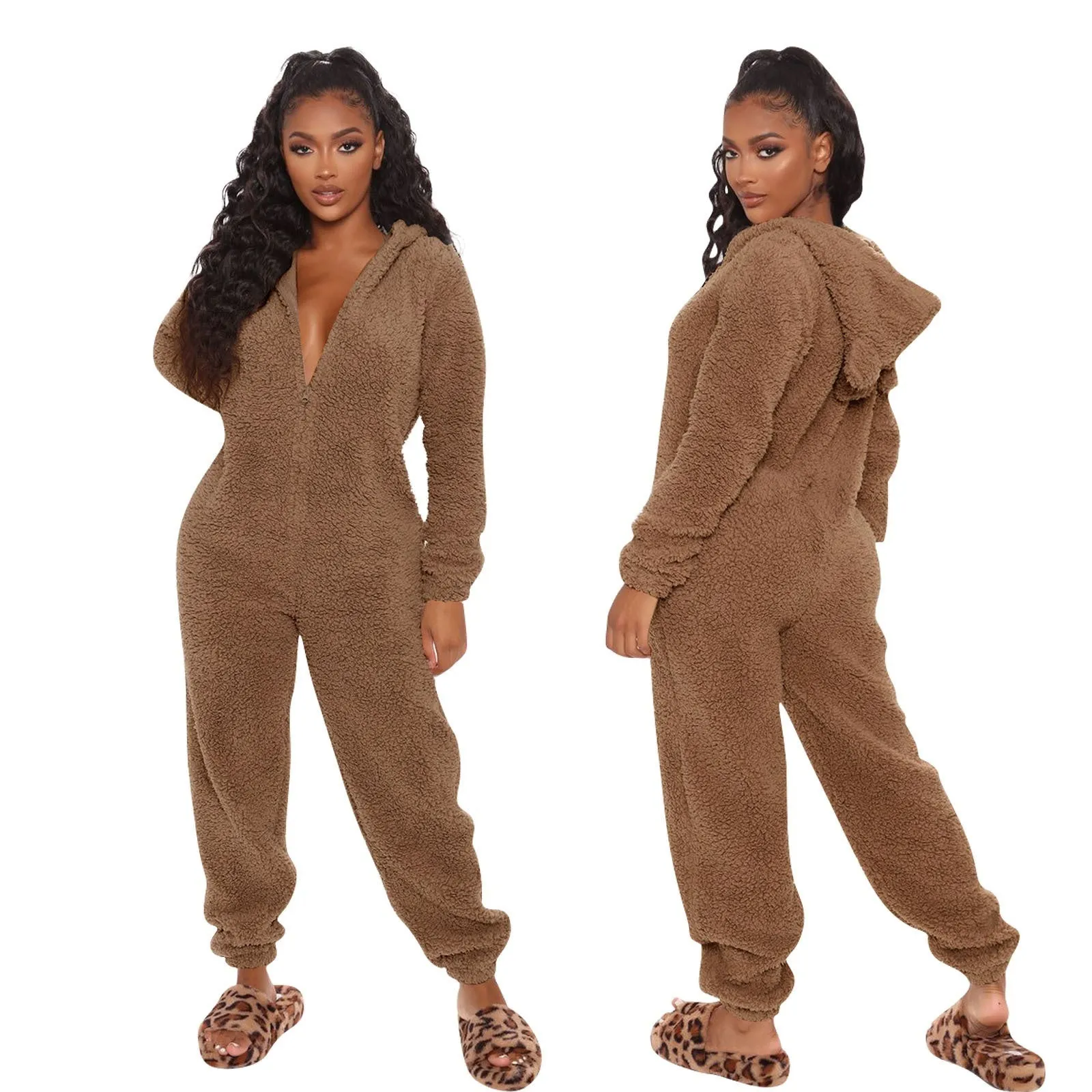 Fleece-lined thickened furry hooded jumpsuit pajama with zipper, loose fit, warm red colour lounging on bed
