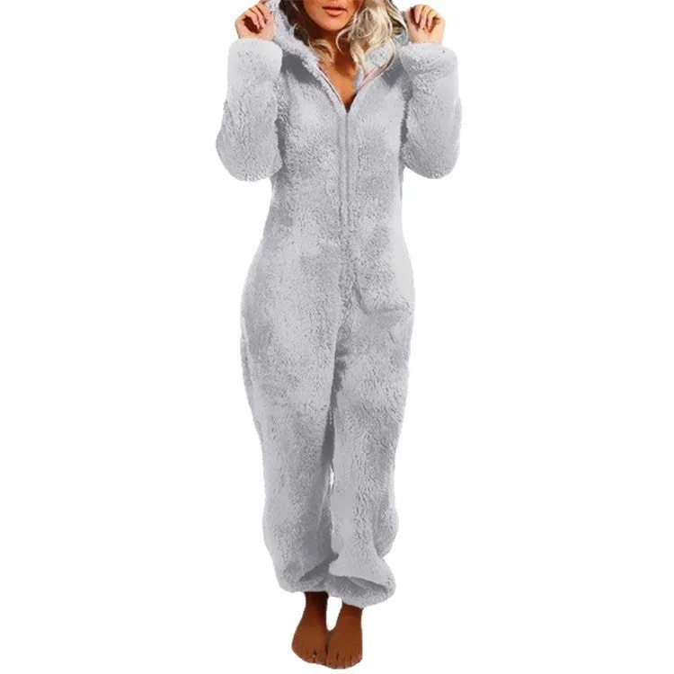 Fleece-lined thickened furry hooded jumpsuit pajama with zipper, loose fit, warm red colour lounging on bed