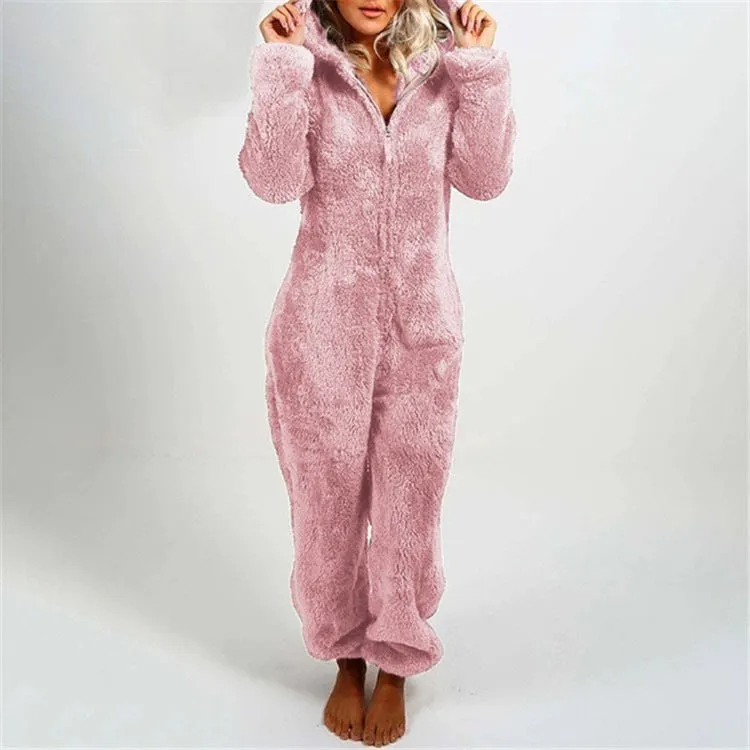 Fleece-lined thickened furry hooded jumpsuit pajama with zipper, loose fit, warm red colour lounging on bed