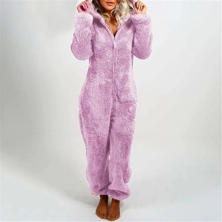 Fleece-lined thickened furry hooded jumpsuit pajama with zipper, loose fit, warm red colour lounging on bed