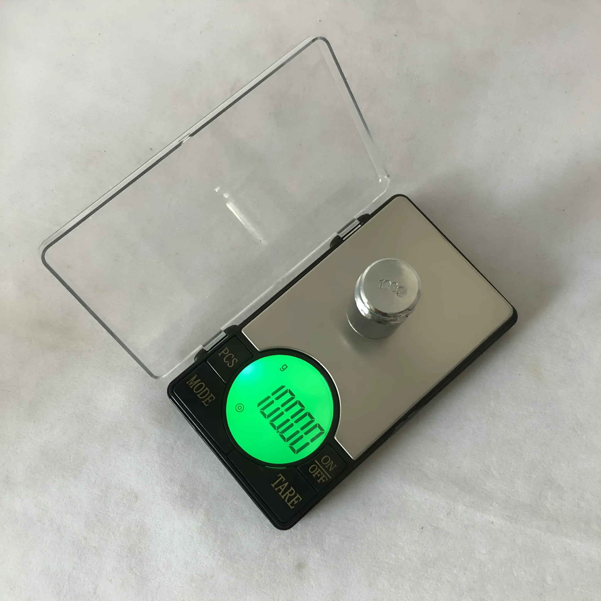 Electronic scale disc display showing gram weight, available in 200g 0.01 precision