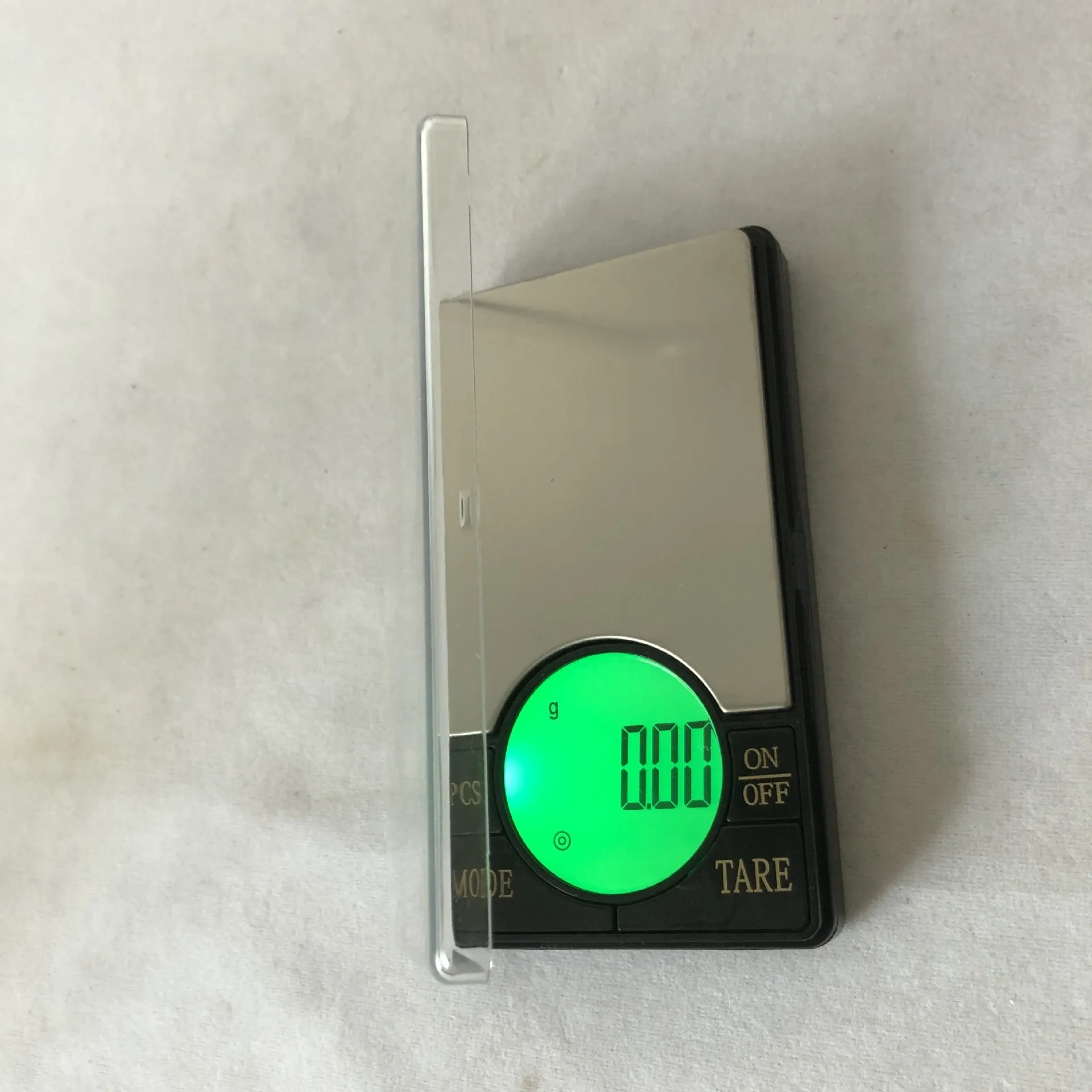 Electronic scale disc display showing gram weight, available in 200g 0.01 precision