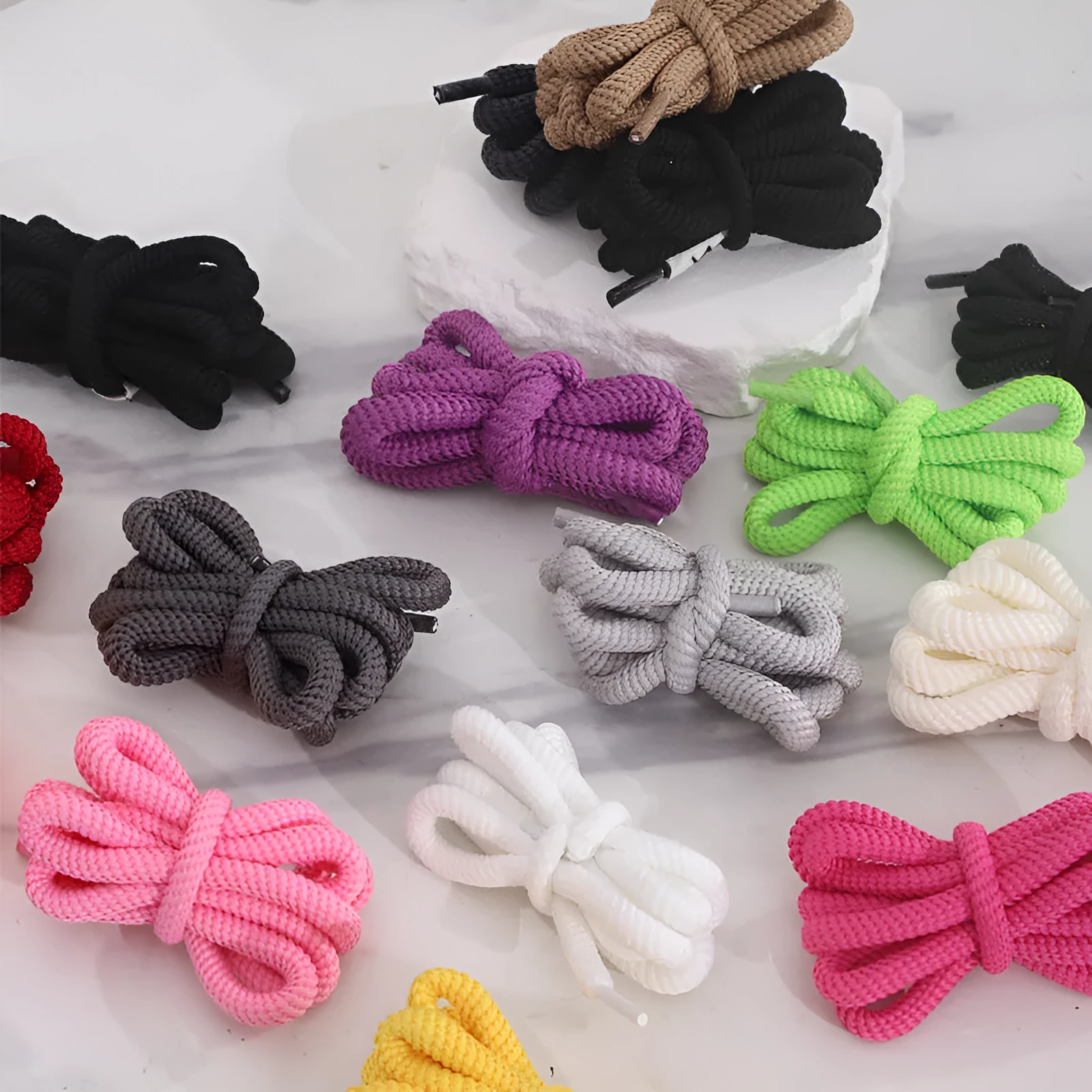Round 1.0cm wide shoelace replacement cord in multiple colour options on a white background.