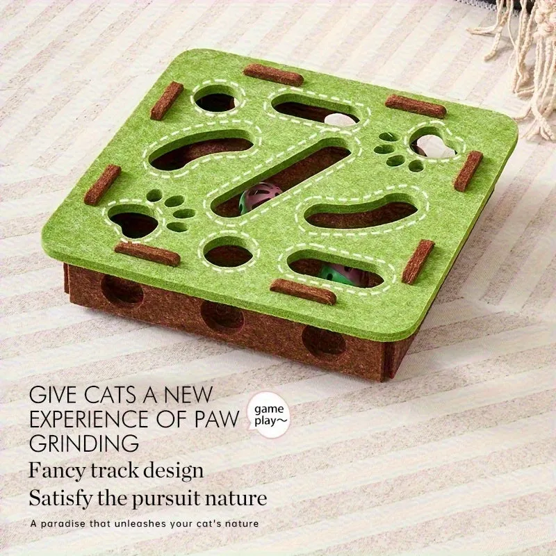 Interactive cat puzzle toy with felt maze tunnel and bell ball on a carpet