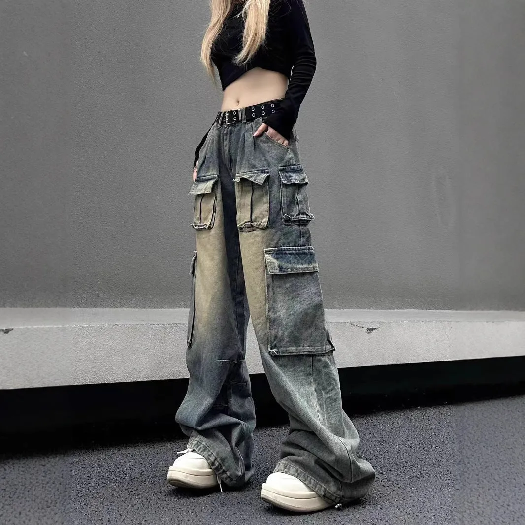 Man wearing loose light blue distressed jeans with multiple pockets, showcasing the straight-leg and utility style.