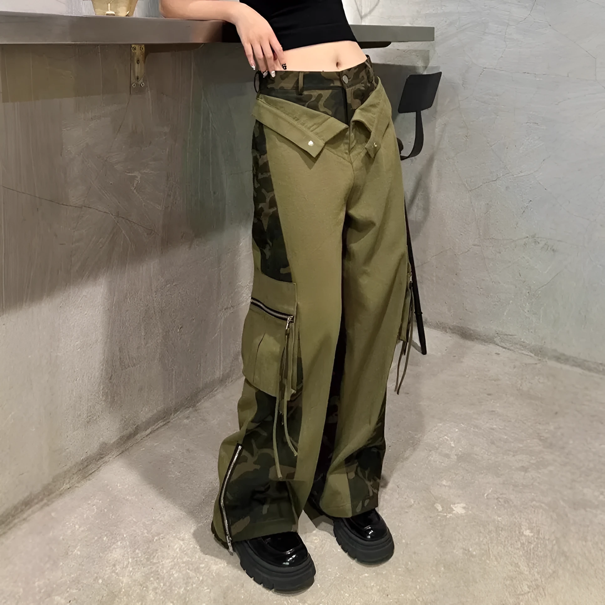 Dark khaki leopard print high waist straight leg jeans with contrast colour stitching on a mannequin.