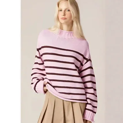 Pink stripe chenille knitted pullover with round neck and long sleeves on display