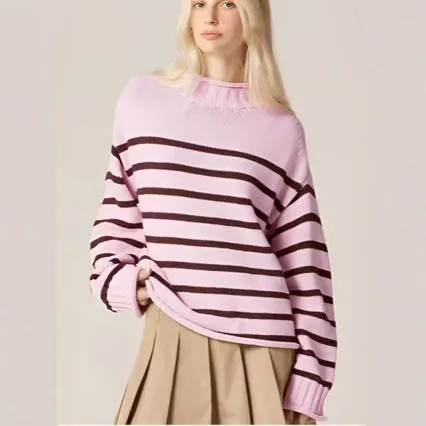 Pink stripe chenille knitted pullover with round neck and long sleeves on display