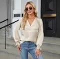 Women's loose fit V-neck long sleeve polyester pullover shirt in beige, front view