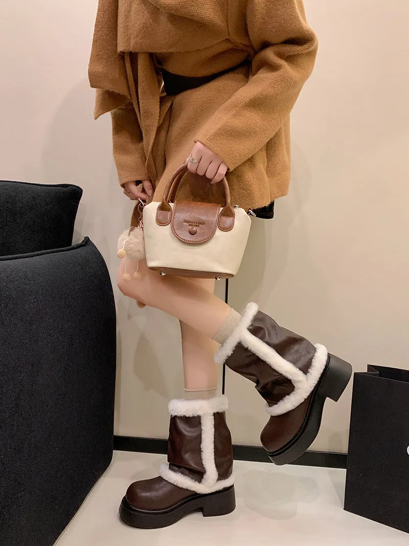 Women's winter faux fur lined short ankle booties with thick bottom and plush trim in black and brown