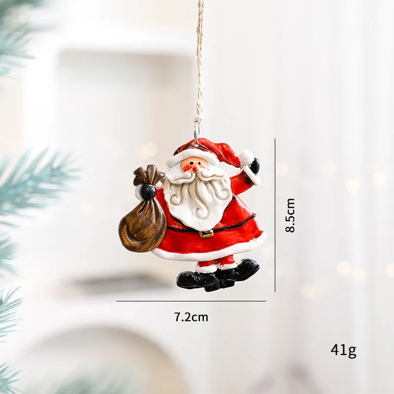 Small resin Christmas tree pendant ornament with a snowman figure holding a broom