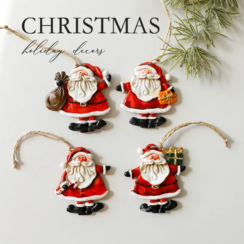 Small resin Christmas tree pendant ornament with a snowman figure holding a broom