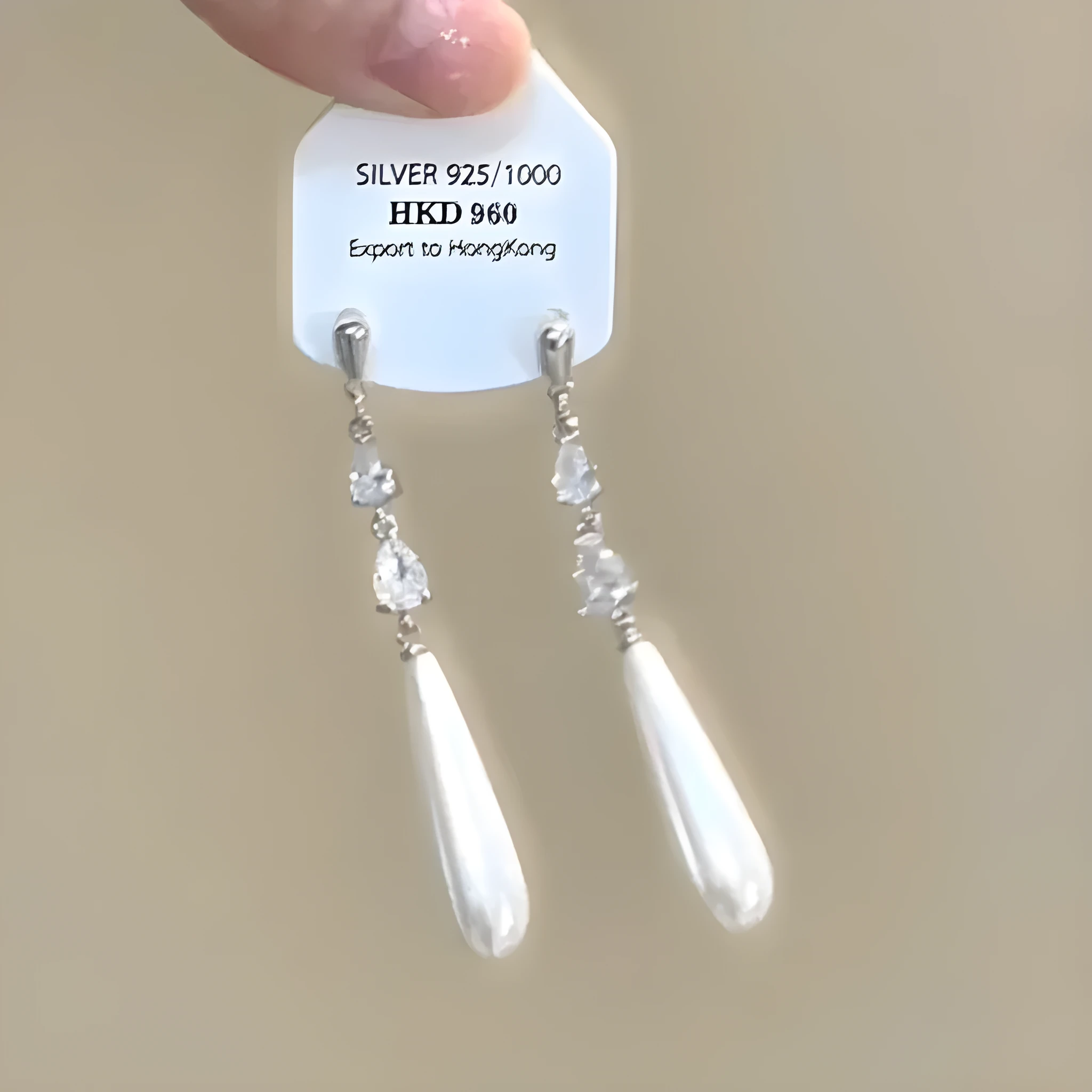 Geometric gold electroplated alloy ear clip jewellery with rhinestone and little stars tassel decoration
