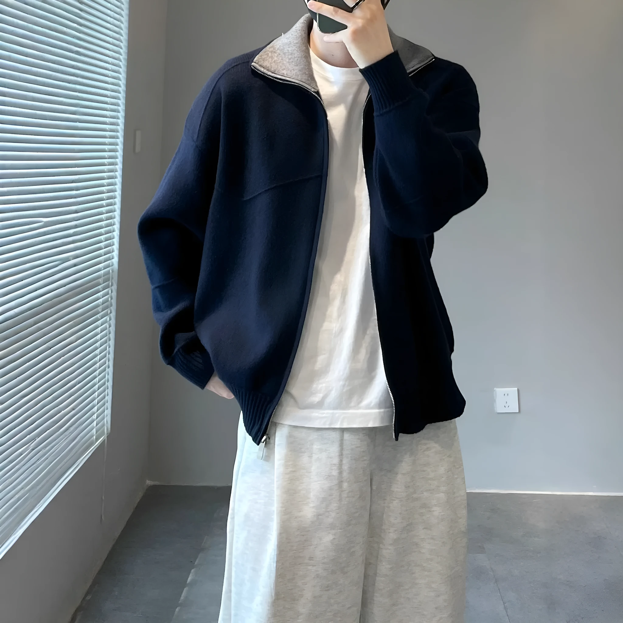 Men's loose fit contrast colour knitted cardigan sweater in apricot, front view, long sleeves, retro style