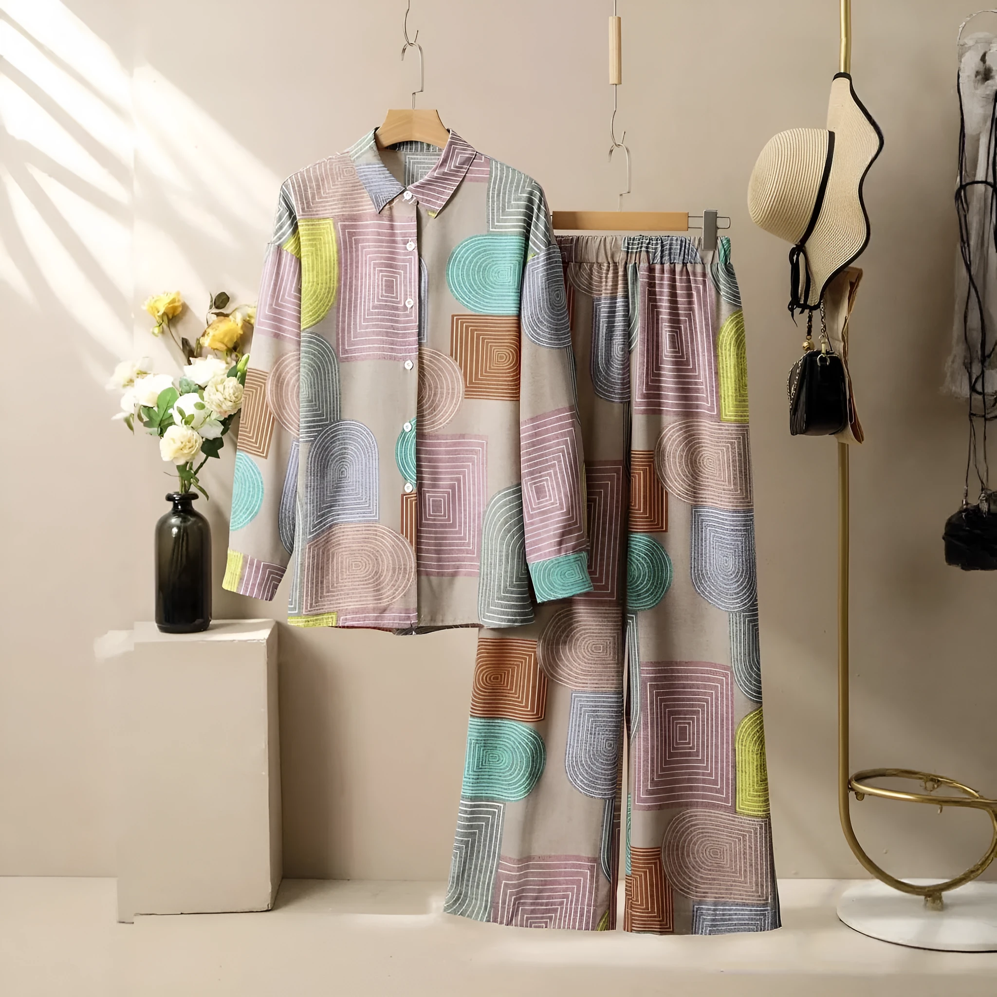 Women's geometric print long sleeve trouser suit in polyester with button detail, casual style