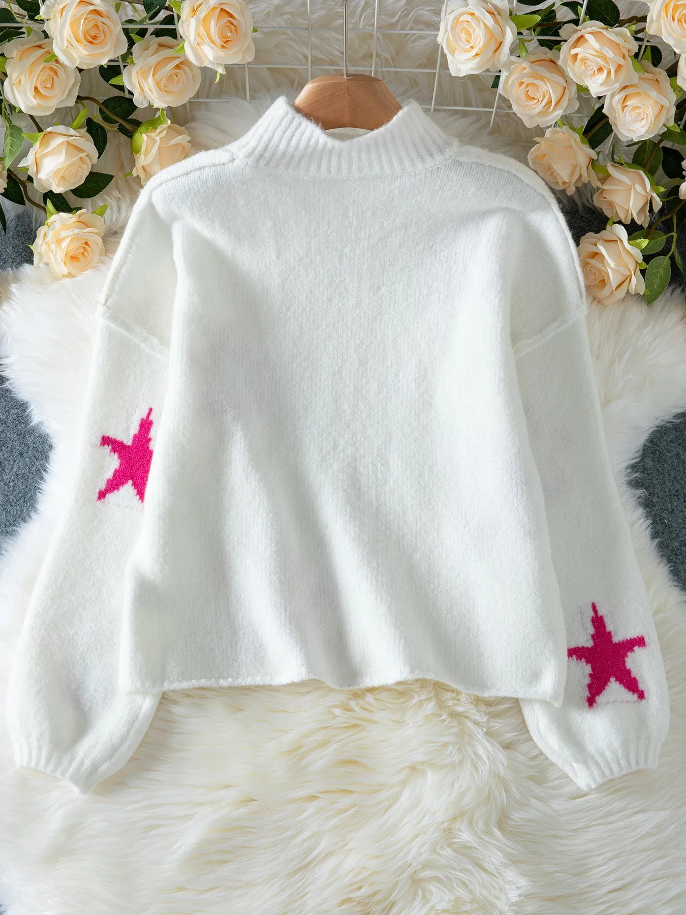 White women's loose turtleneck pullover sweater with a five-pointed star pattern in imitation velvet fabric.