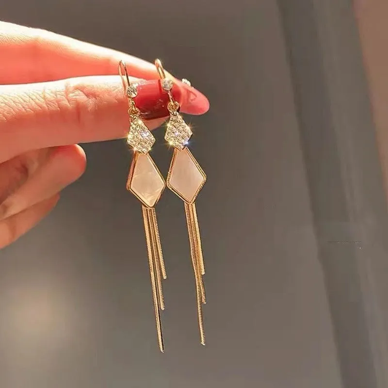 Alloy tassel strip earrings with electroplated finish in white showing Gang Diamond Ice Flower design