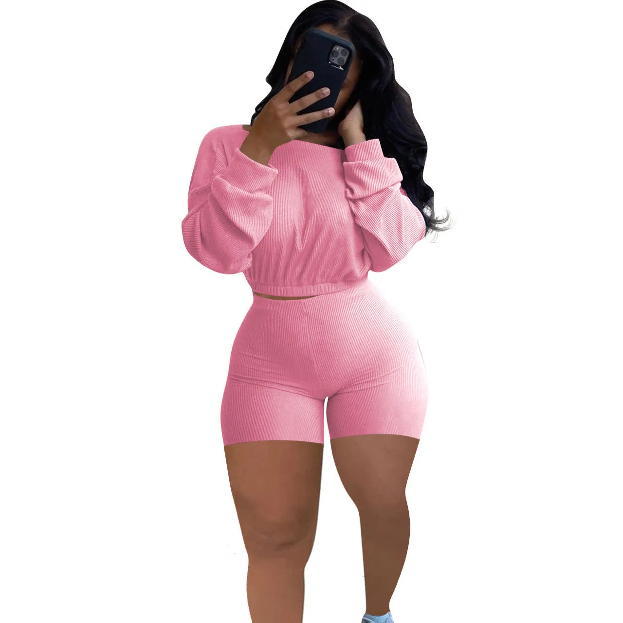 Off-the-shoulder long sleeve top and shorts two-piece set in a solid colour with a sunken stripe pattern.