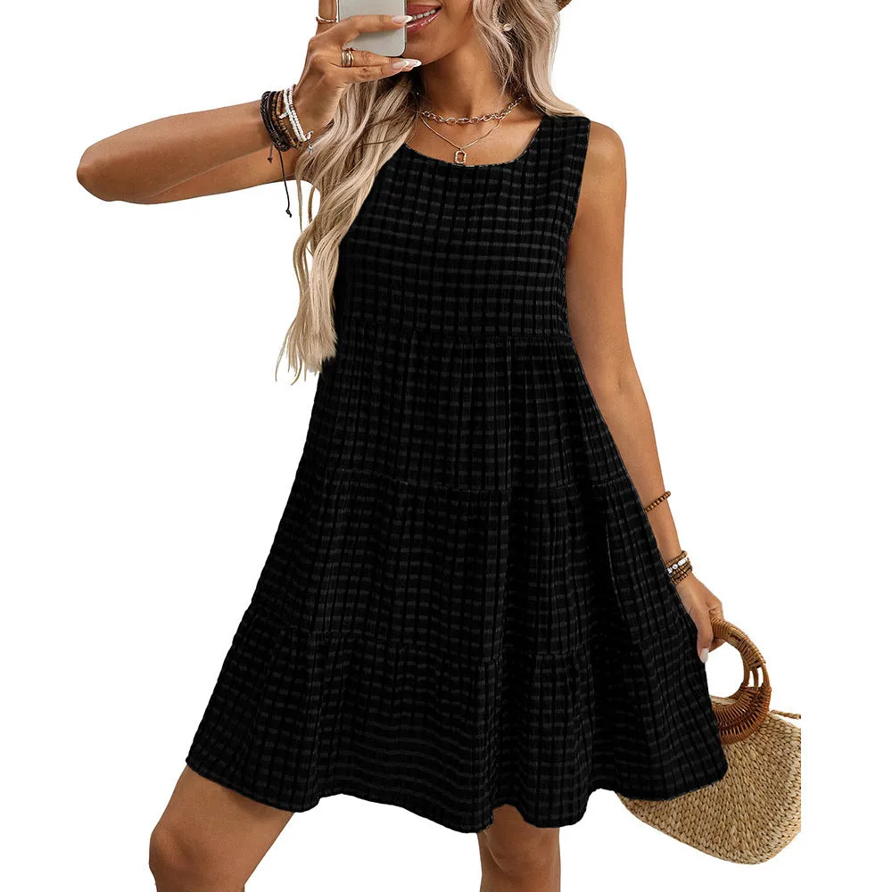 Women's loose fit sleeveless plaid dress with an oversized swing skirt in light blue.