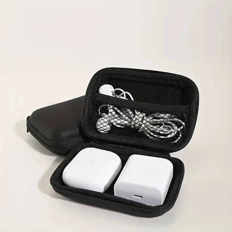 Compact black EVA travel storage box for headset cables, size 11x7.5x4 cm, on a neutral background.