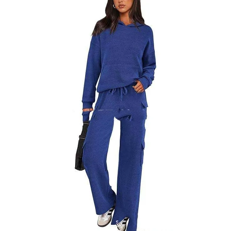 Women's long sleeve polyester leisure sports suit set with trousers in multiple colour options.