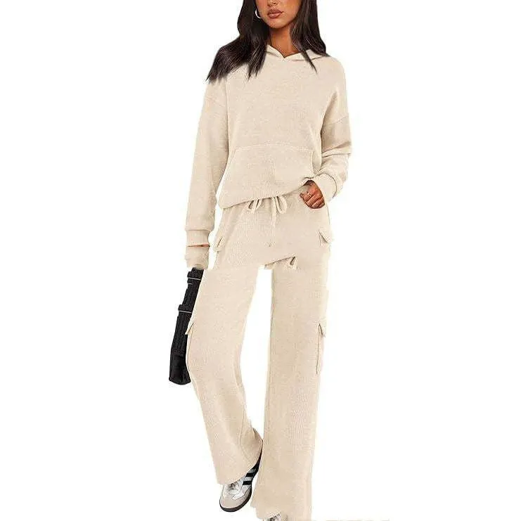 Women's long sleeve polyester leisure sports suit set with trousers in multiple colour options.