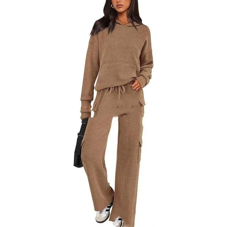 Women's long sleeve polyester leisure sports suit set with trousers in multiple colour options.