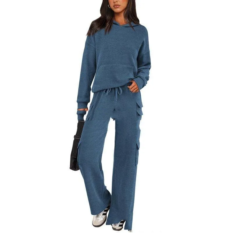 Women's long sleeve polyester leisure sports suit set with trousers in multiple colour options.