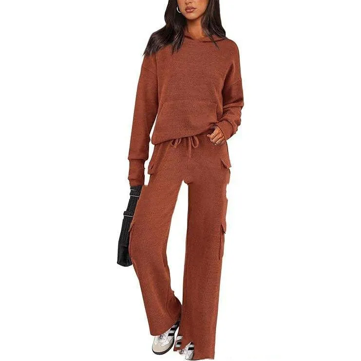 Women's long sleeve polyester leisure sports suit set with trousers in multiple colour options.