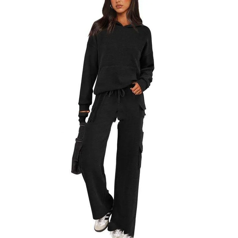 Women's long sleeve polyester leisure sports suit set with trousers in multiple colour options.