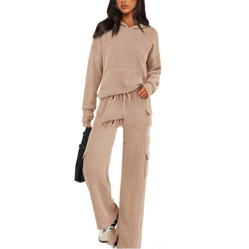 Women's long sleeve polyester leisure sports suit set with trousers in multiple colour options.