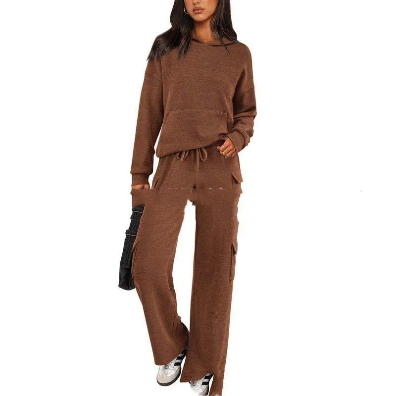 Women's long sleeve polyester leisure sports suit set with trousers in multiple colour options.