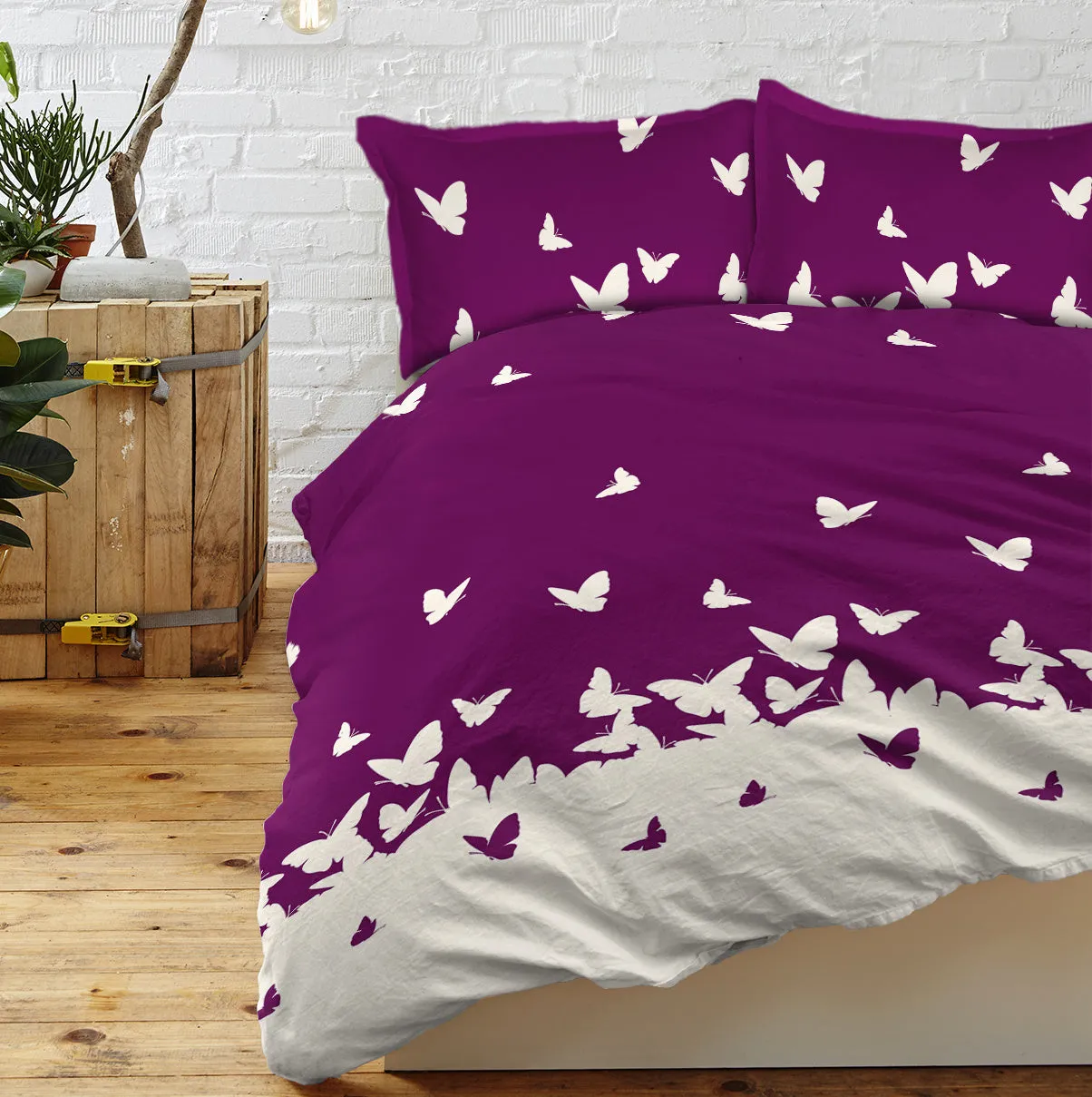 Purple butterfly 3-piece microfiber comforter set with reversible design on a bed