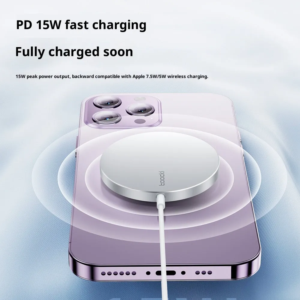 White simulation Apple style 15W strong magnetic suction wireless charger on a desk