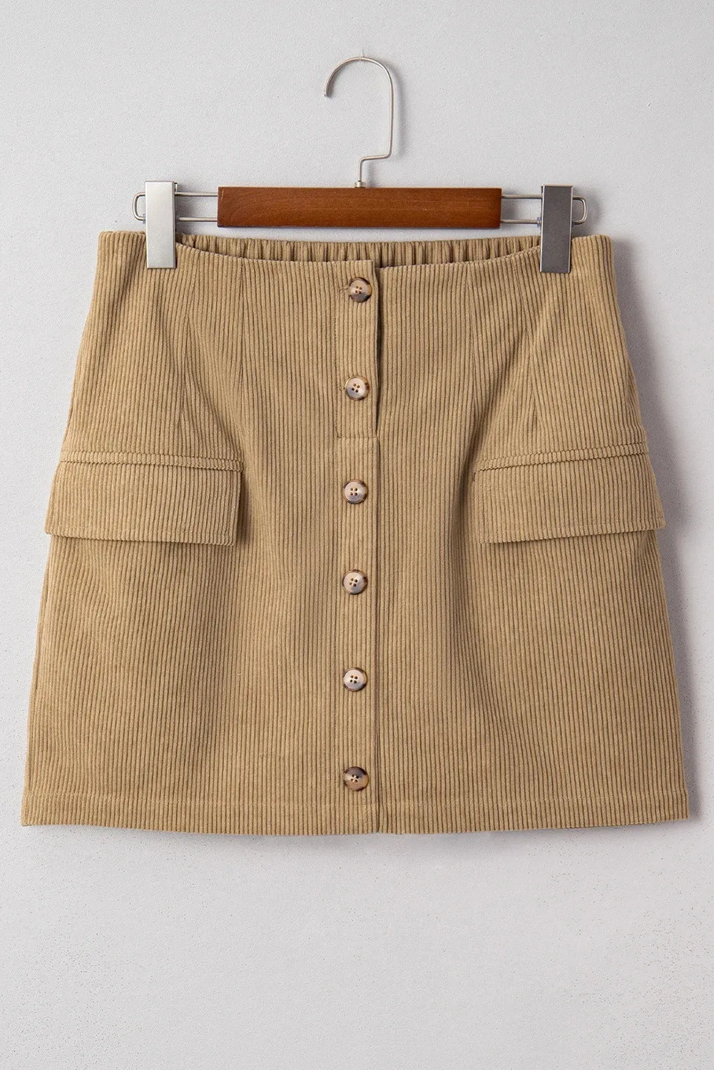 Women's corduroy hip skirt in coffee colour with button detail, short length, polyester fabric