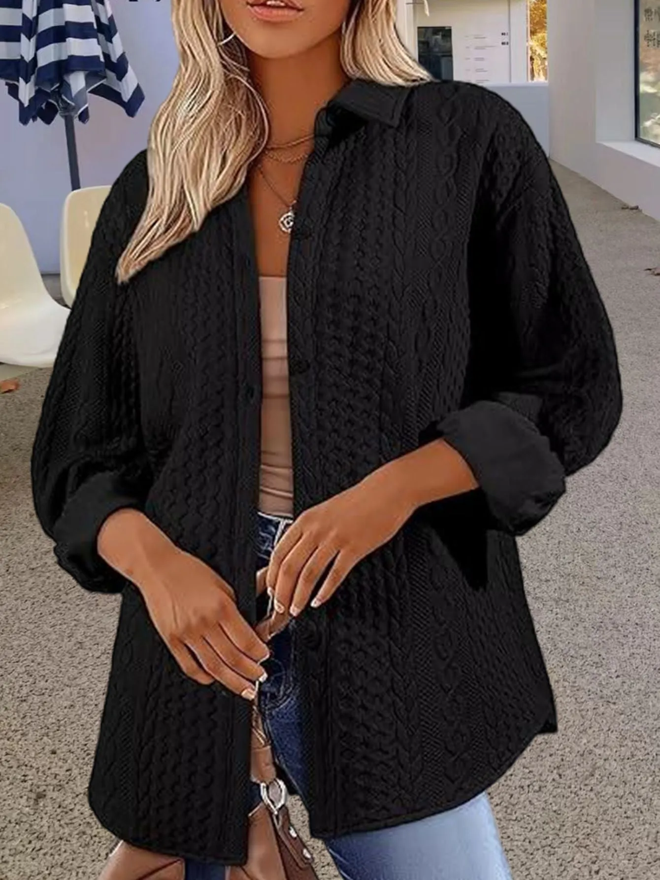 Women's solid colour knitted polyester cardigan sweater in black, shown in a cardigan style with long sleeves.