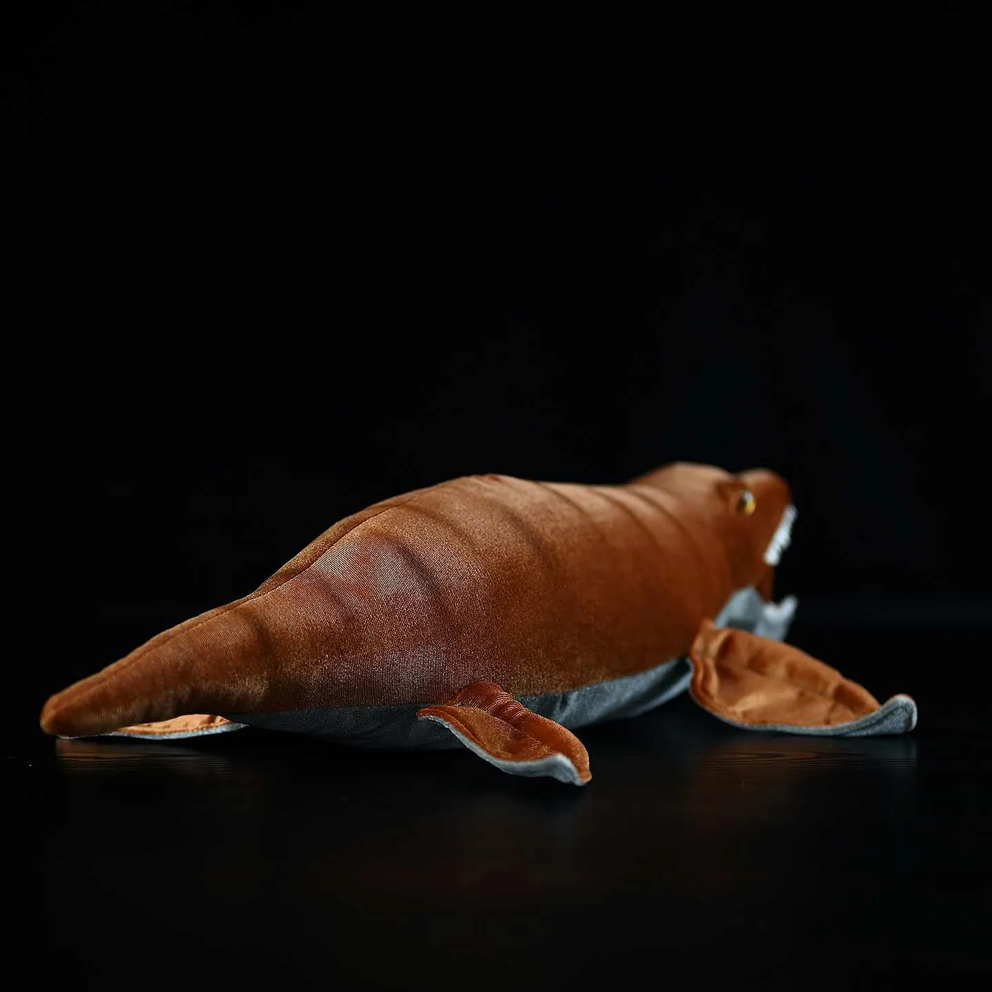 Soft flannel dinosaur plush toy, 48 cm long, standing on a shelf with a gentle expression